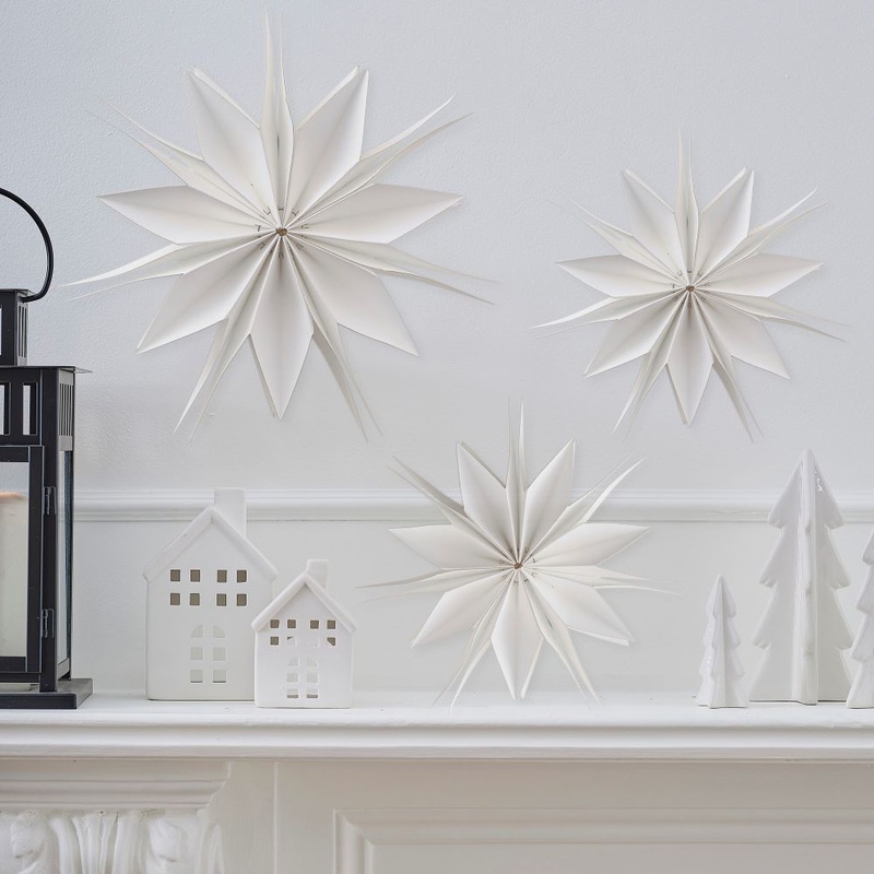 3 white paper stars