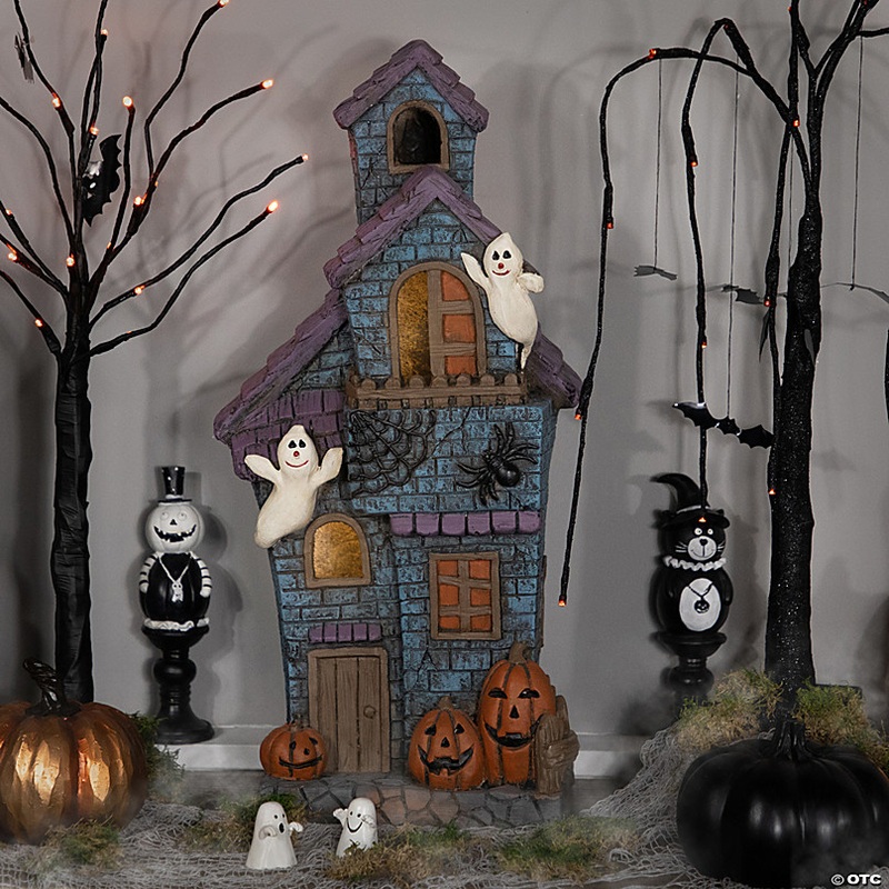 22.75 LED Lighted Haunted House with Ghosts Halloween Decoration